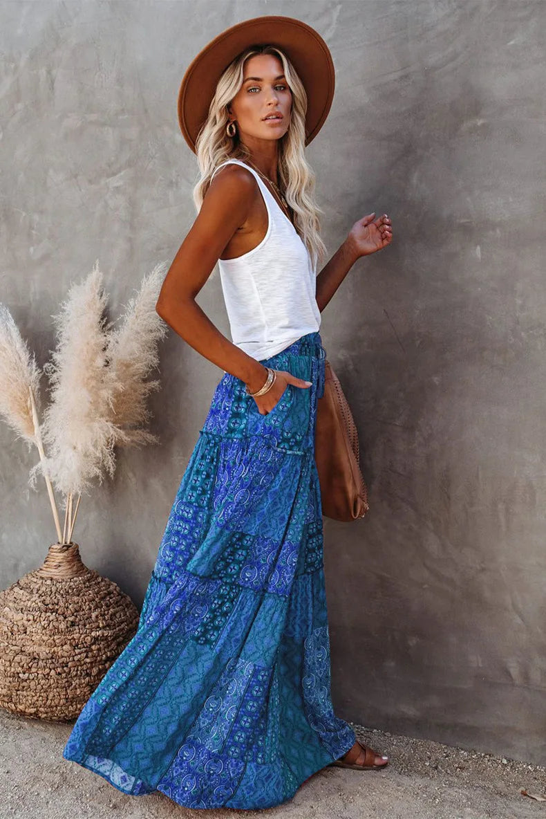 Elegant high-waisted A-line maxi skirt for women, featuring a vibrant floral print.