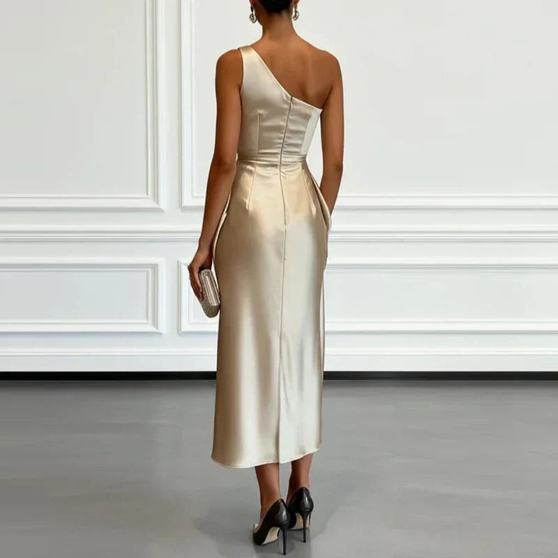 Sophisticated one-shoulder midi dress with elegant drapes & ruching. Ideal for cocktail parties & special occasions.