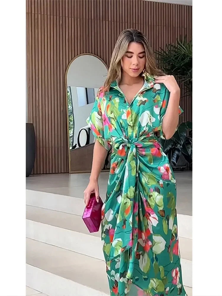 Women's elegant green floral maxi dress with a full button-down front. Versatile long dress for summer & office.