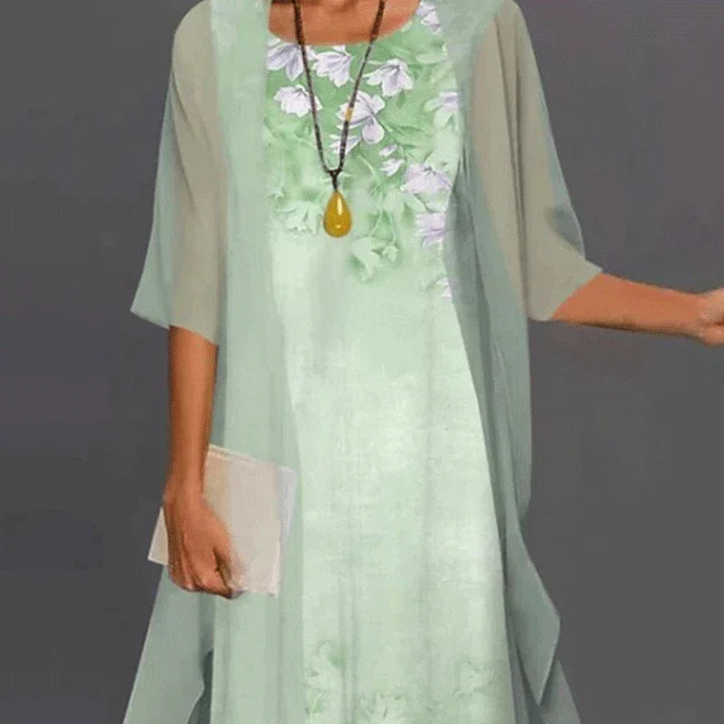 Stylish women's summer casual dress in a versatile midi length. Elegant day-to-night spring fashion.