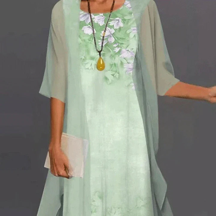 Stylish women's summer casual dress in a versatile midi length. Elegant day-to-night spring fashion.