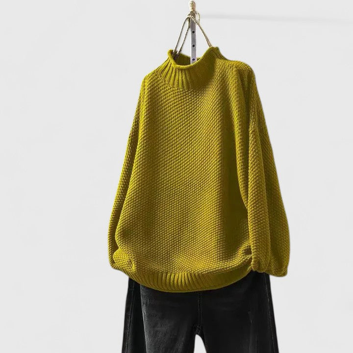 Stylish women's relaxed fit mock neck long sleeve sweater, great for chic casual fall & winter fashion.