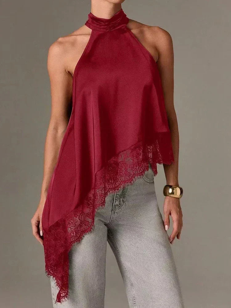 Elegant women's halter top, ideal for smart casual or evening events, with a unique asymmetric lace hem.