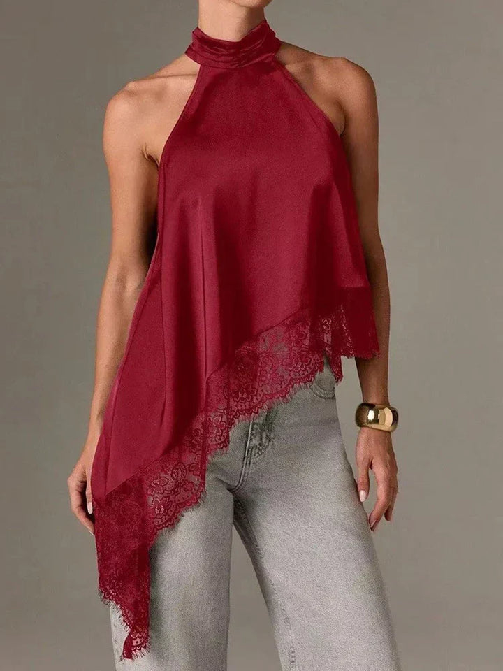 Elegant women's halter top, ideal for smart casual or evening events, with a unique asymmetric lace hem.