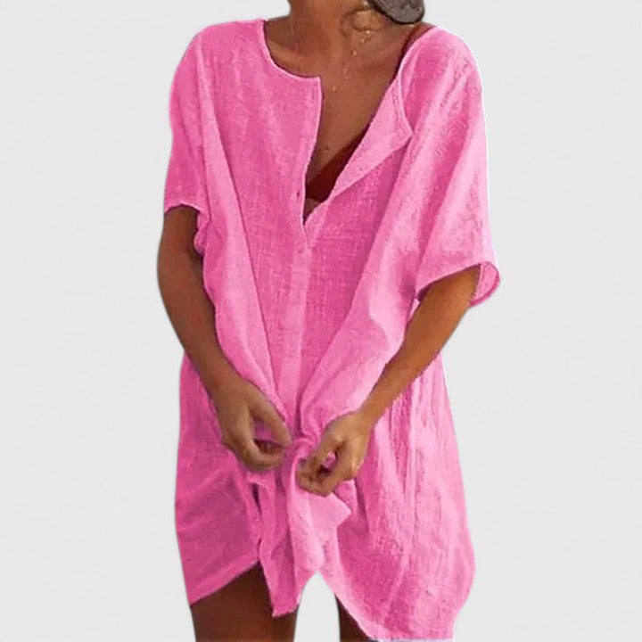 Lightweight women's tunic dress, perfect for hot summer days, offering both casual comfort and elegant style. Chic.