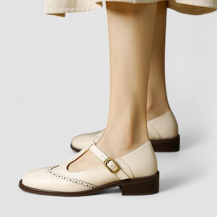Women's classic black Mary Jane shoes with instep strap, round toe, comfortable flats for everyday wear.