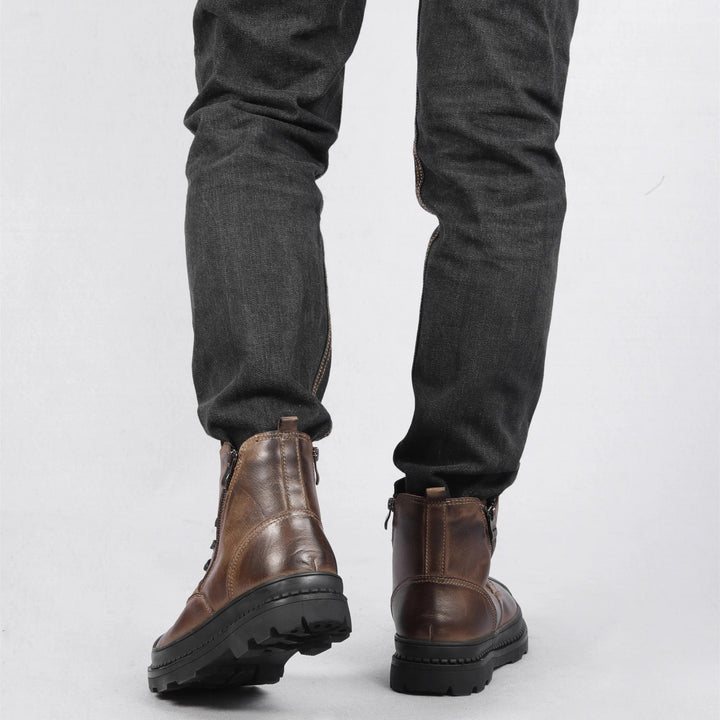 Men's vintage lace-up combat boots featuring a convenient side zip. Durable leather for all-day wear.