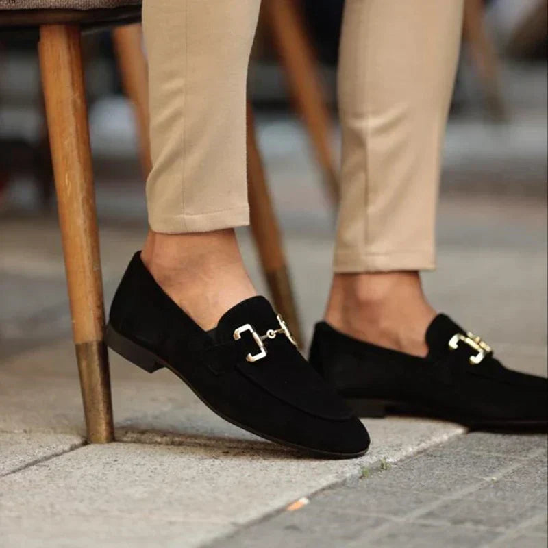 Modern men's slip-on loafers with an elegant metal buckle, combining comfort and contemporary mens fashion.