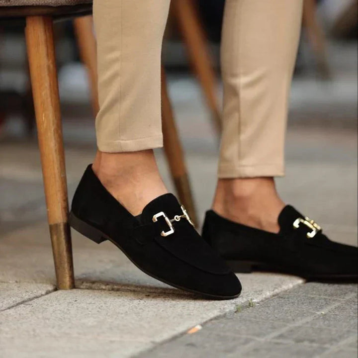 Modern men's slip-on loafers with an elegant metal buckle, combining comfort and contemporary mens fashion.