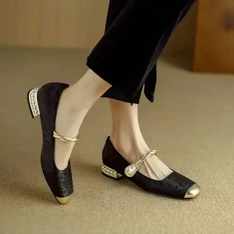 Sophisticated women's pearl strap Mary Jane shoes, vintage-inspired for elegant events.