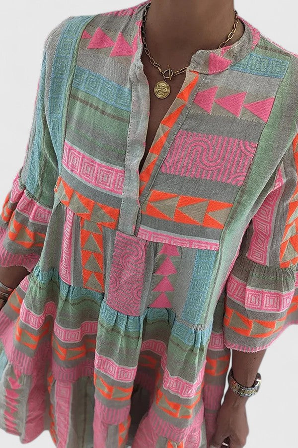 Flowy women's casual summer dress with a stylish tiered design, offering ultimate comfort and a boho look.