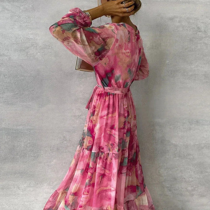 Versatile women's floral wrap midi dress in elegant pink, suitable for wedding guests, summer events, or formal occasions.