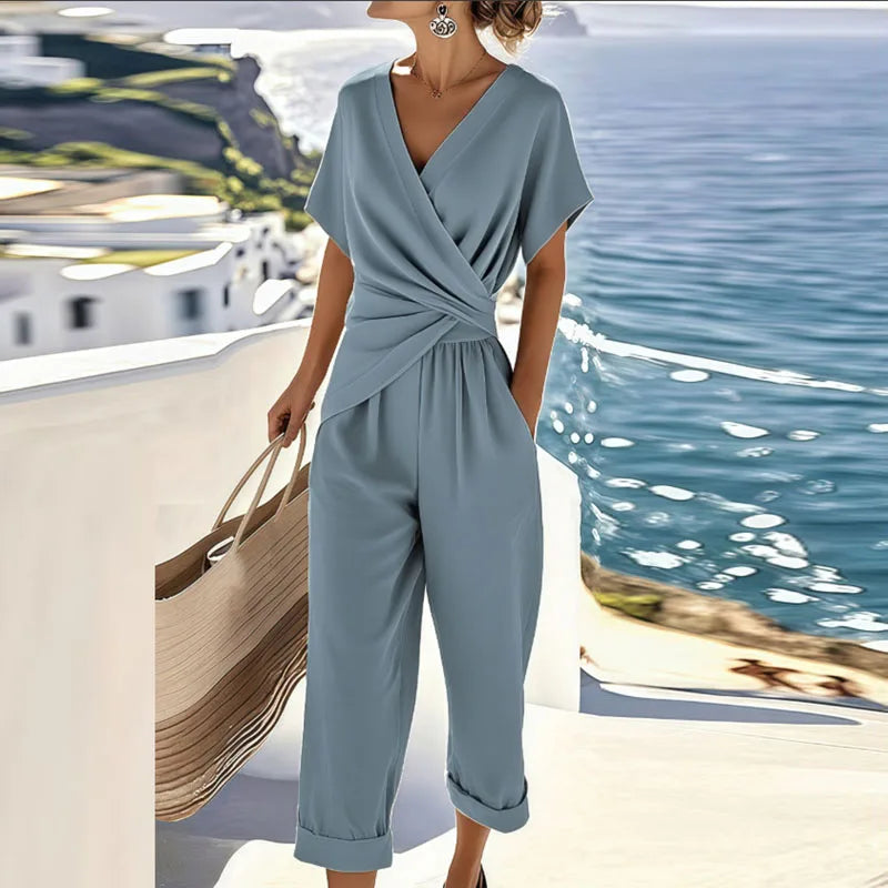 Breathable women's wrap top and cropped pants set; a versatile two-piece outfit for elegant summer or casual occasions.