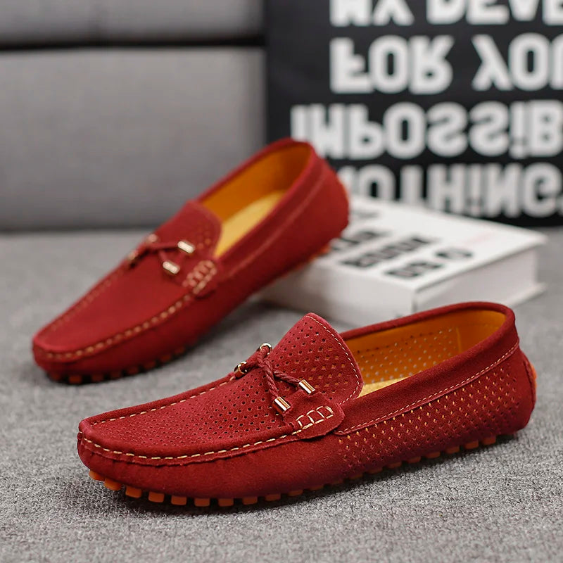 Close-up of texture on men's breathable classic loafers, emphasizing quality and comfort features.