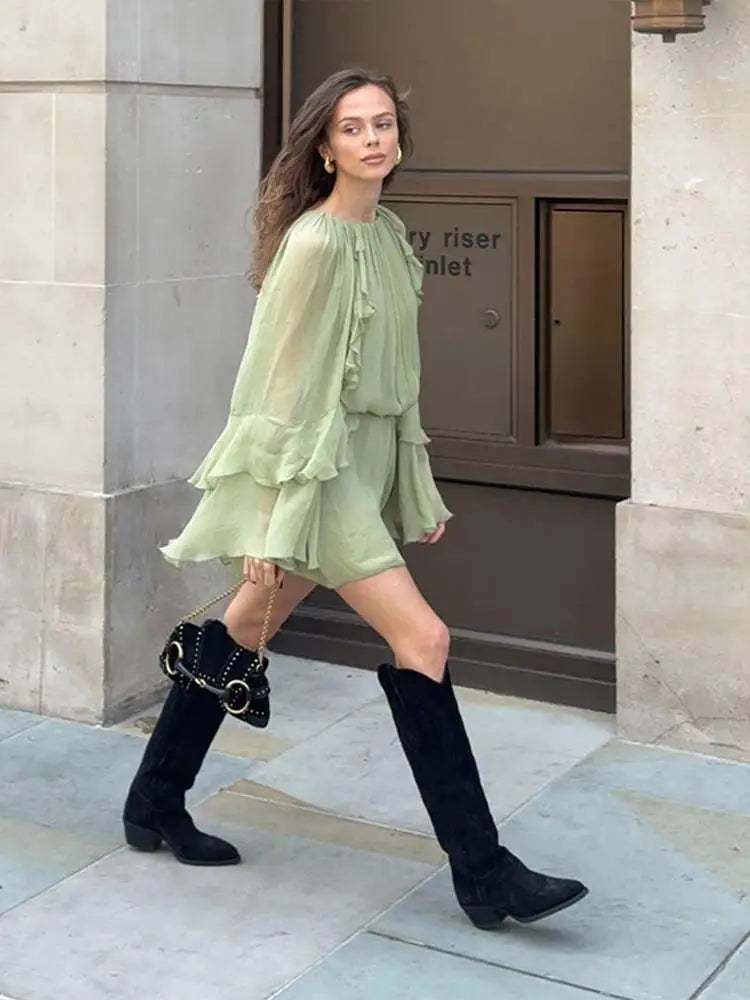 Dreamy flowing tiered mini dress for women. Stylish and comfortable summer wear, relaxed fit.