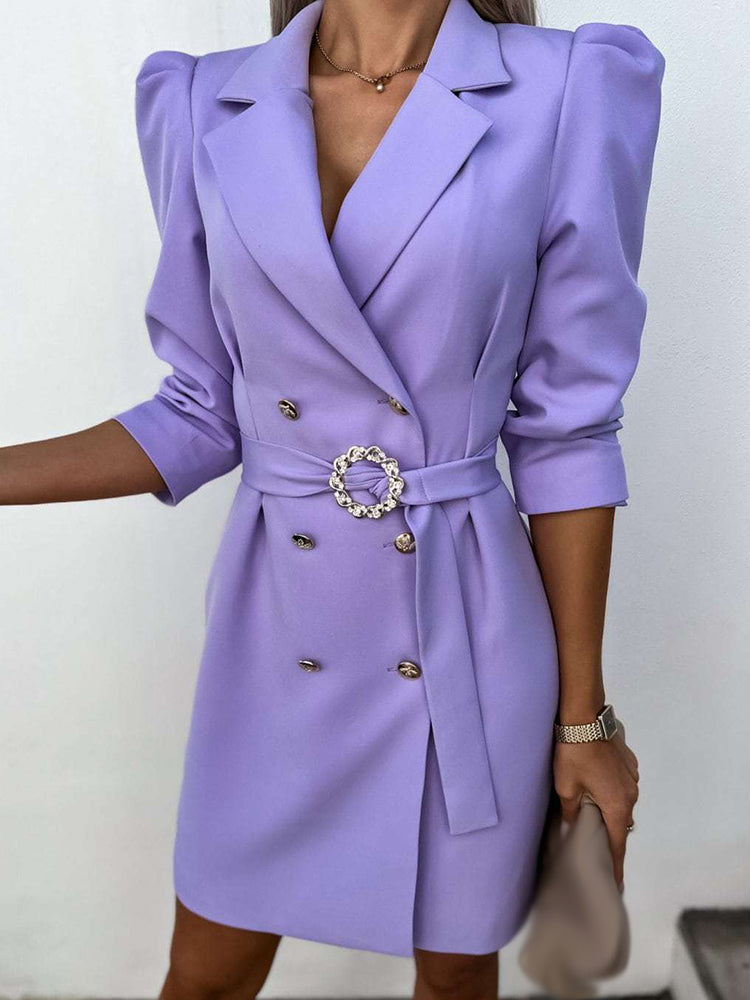 Impeccably tailored women's blazer dress, double-breasted design with a stylish belt, for a sleek, modern look.