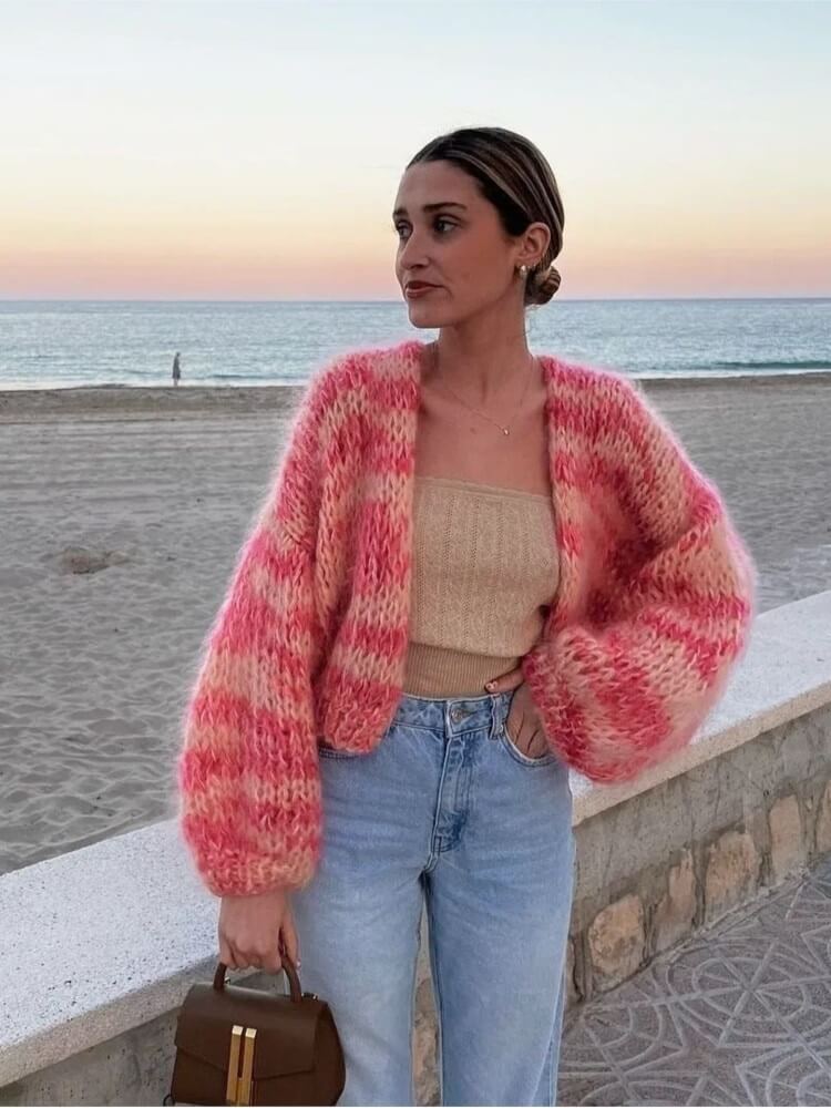 Women's stylish color block cropped knit sweater. A comfortable and trendy top for modern casual fashion.
