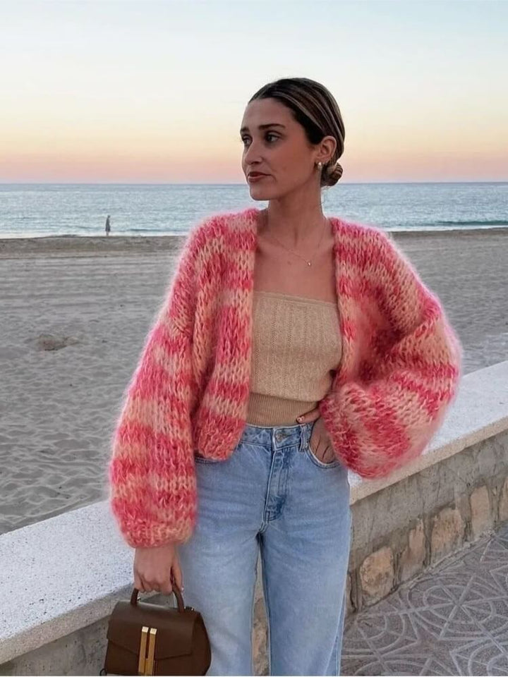 Women's stylish color block cropped knit sweater. A comfortable and trendy top for modern casual fashion.