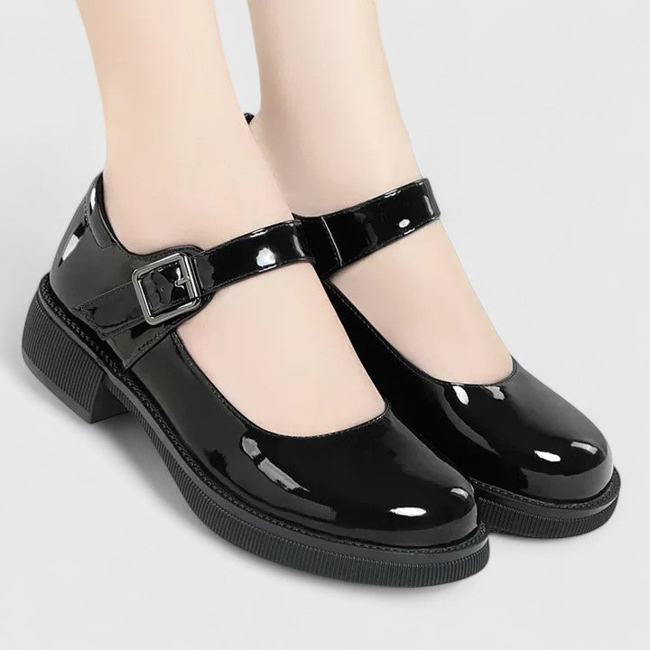 Matte black women's orthopaedic shoes, built for durable comfort, support, and stylish everyday relief.