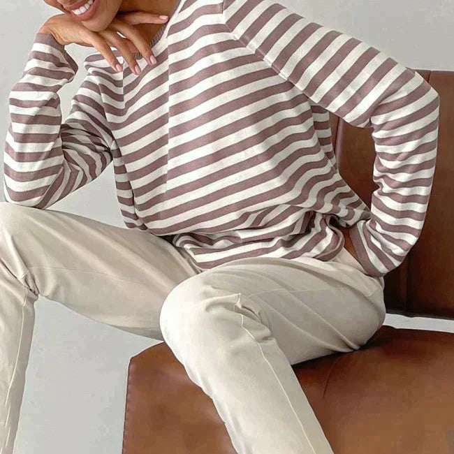 Women's elegant striped t-shirt with a comfortable fit & stylish design for everyday wear.