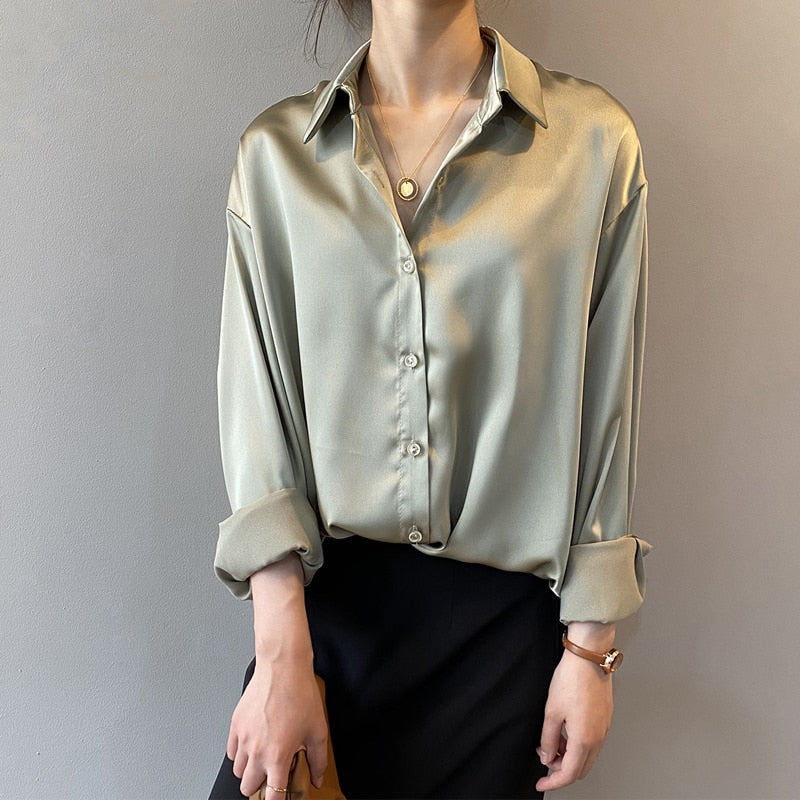 Classic women's long sleeve blouse, a sophisticated vintage top ideal for office or elegant casual outfits.