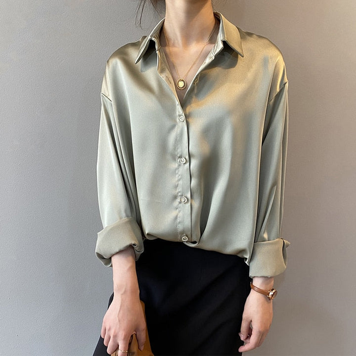 Classic women's long sleeve blouse, a sophisticated vintage top ideal for office or elegant casual outfits.