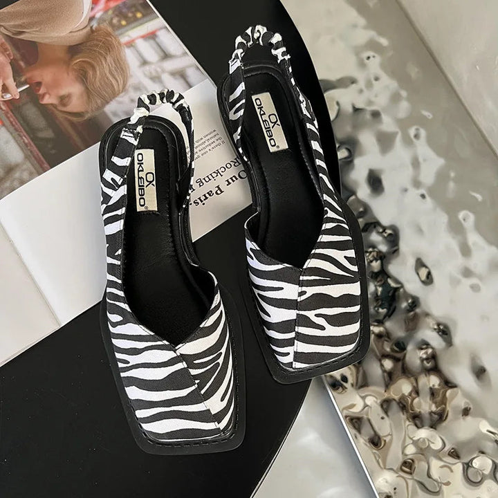 Orthopedic flat sandals for women, designed for ultimate comfort, arch support, and versatile casual summer wear.