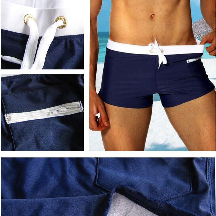 Man wearing men's quick-dry swim shorts, comfort waistband, walking on the beach.