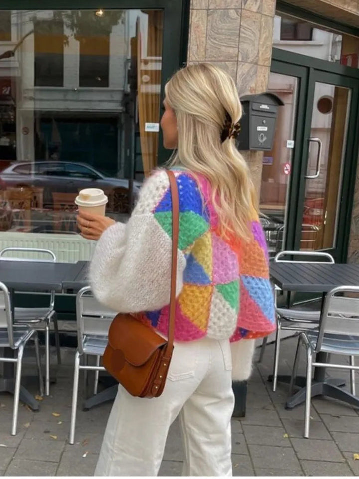 Stylish women's color block cropped sweater. Comfortable knitwear, perfect for trendy casual wear.