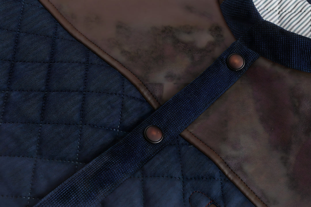 Man wearing a stylish navy button-down quilted jacket, showcasing modern fall outerwear.
