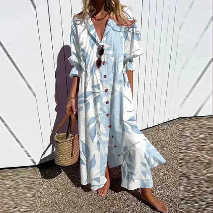 Stylish women's flowy maxi dress in a bohemian style, featuring a comfortable relaxed fit and elegant V-neck design.
