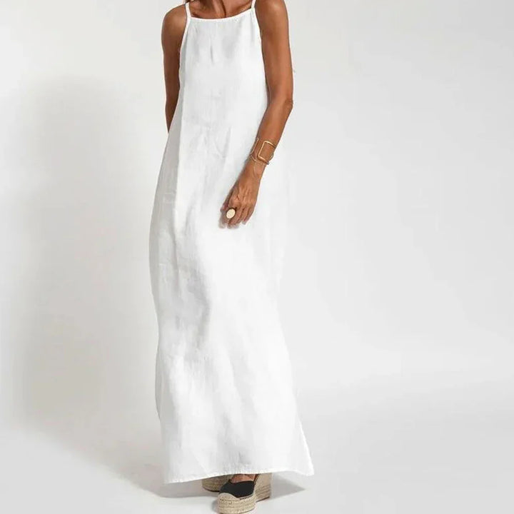 Elegant women's maxi slip dress with stylish side slits. Perfect for evening wear or summer vacation fashion.