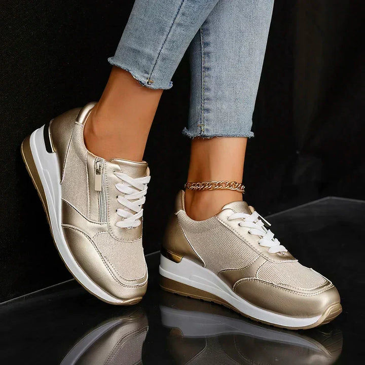 Comfortable women's orthopaedic platform sneakers, perfect for all-day wear with stylish metallic finish.
