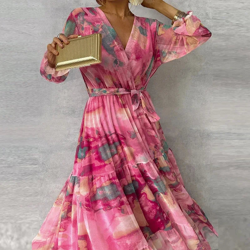 Beautiful floral wrap wedding guest dress for women. Elegant pink midi style, ideal for summer parties & special occasions.