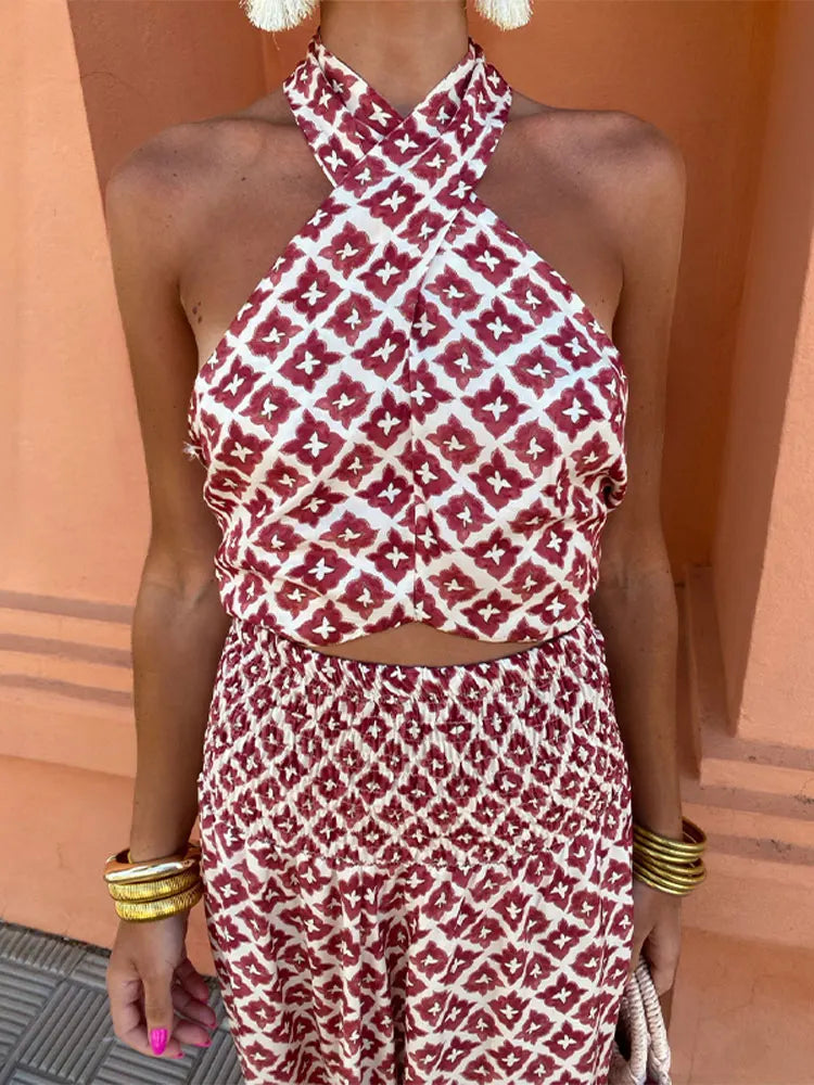 Stylish women's two-piece set: off-shoulder ruffle top paired with a matching high-waisted skirt for parties.
