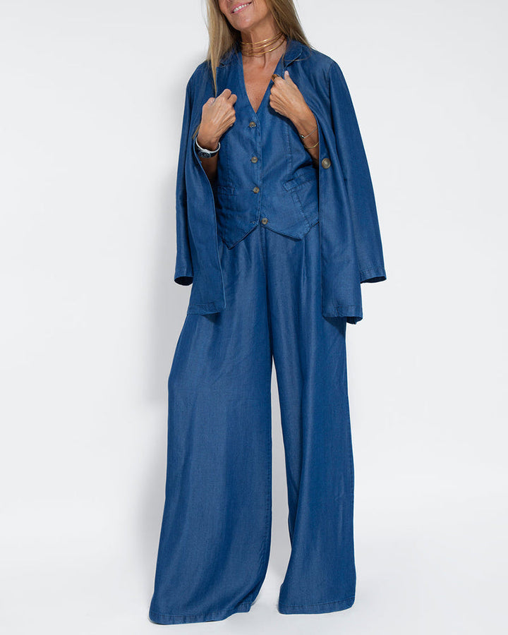 Feminine two-piece wide leg pants and vest set, offering a comfortable yet chic summer look.