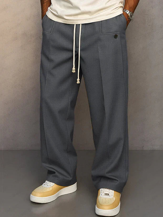 Comfortable men's classic drawstring pants, ideal for relaxed fit everyday wear. Versatile and stylish casual trousers.