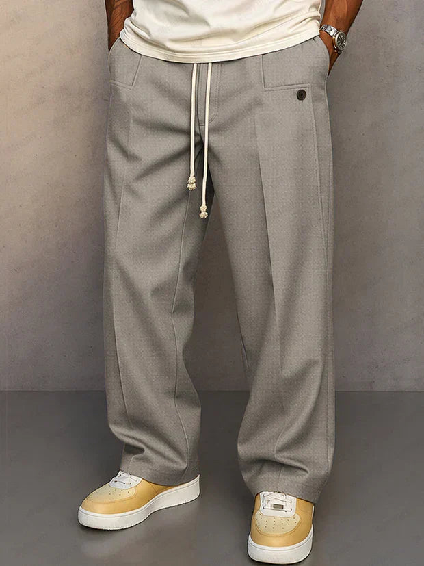 Relaxed fit men's drawstring trousers, combining ultimate comfort with stylish everyday wear. Perfect casual pants.