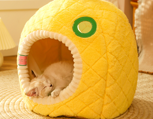 Cozy pineapple cat cave, a unique soft pet bed for cats to sleep. Ideal pet furniture for comfort.