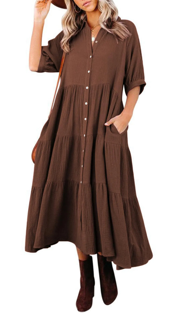 Stylish women's summer midi dress with pockets, providing comfort and versatility for any warm day.