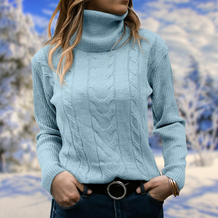 Elegant women's warm turtleneck pullover. Soft, comfortable long-sleeve sweater, flattering for autumn/winter.