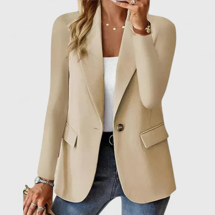 Achieve a sophisticated look with this elegant women's blazer. Perfect tailored jacket for business casual & work wear.