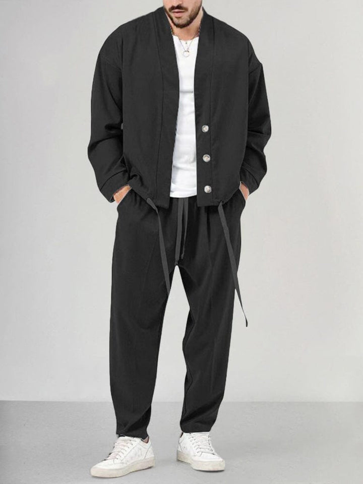 Black men's 2-piece knit lounge set, a comfortable and casual wear outfit with relaxed fit and elastic waist.