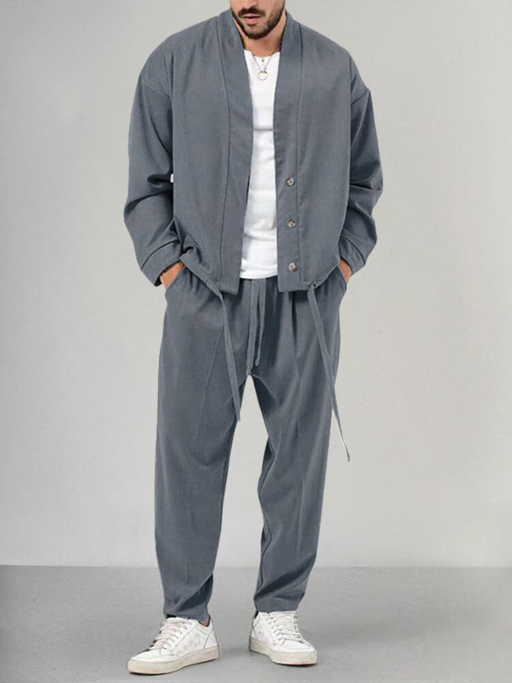 Gray men's 2-piece knit lounge set, featuring a comfortable relaxed fit top & bottom. Ideal men's casual clothing.