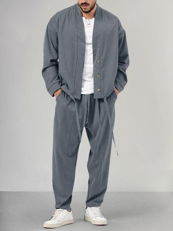 Gray men's 2-piece knit lounge set, featuring a comfortable relaxed fit top & bottom. Ideal men's casual clothing.