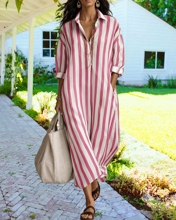 Elegant women's striped long shirt dress, a comfortable loose-fit maxi with button details, great for resort wear.