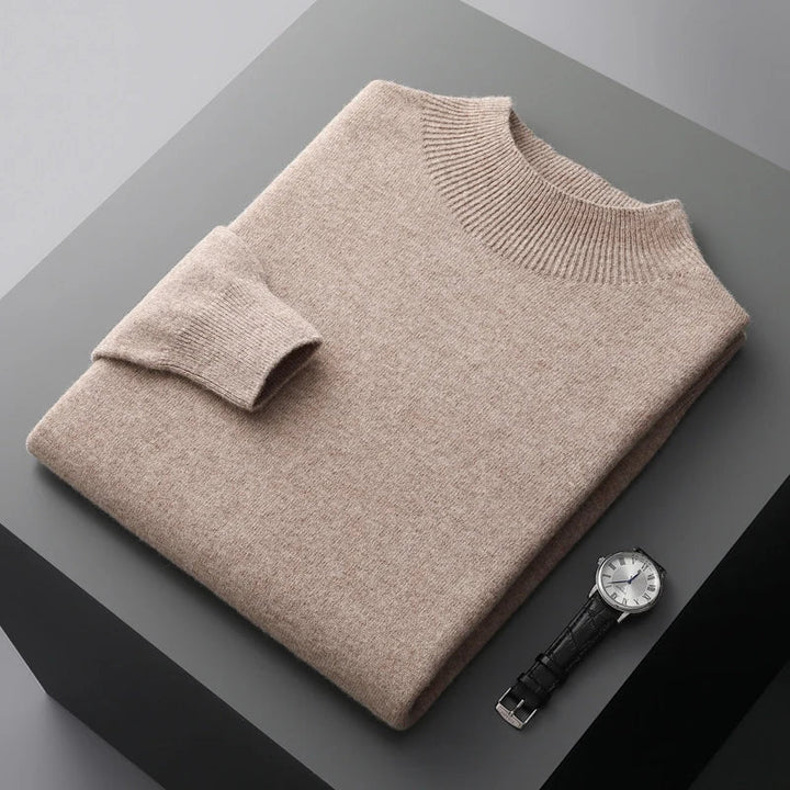 Close-up of a men's mock neck sweater, showing cozy knit texture and detail.
