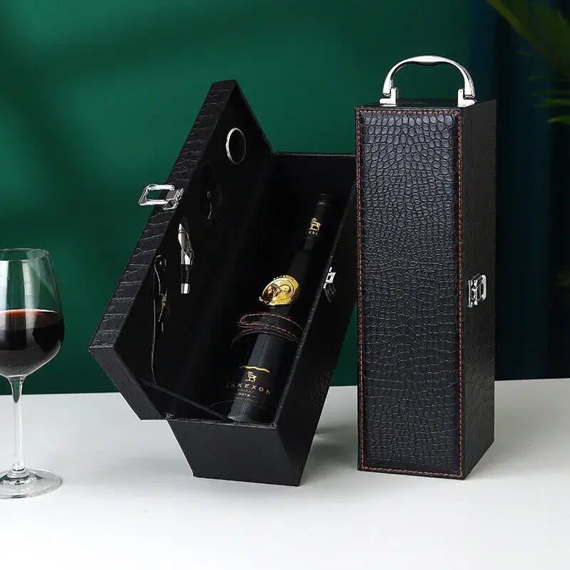 Open luxury wine case revealing compartments for two bottles and integrated accessories.