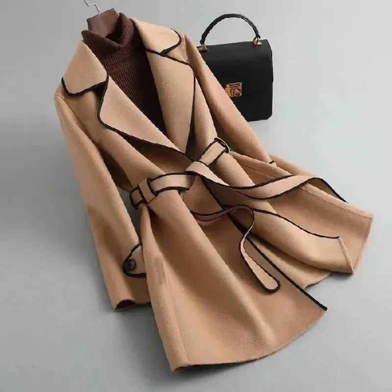 Essential fall & winter women's tailored longline trench coat, classic and elegant fashion statement.