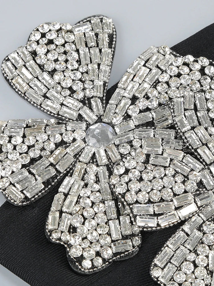 Stylish women's embellished high-waisted two-piece set for elegant parties and festive holiday events.